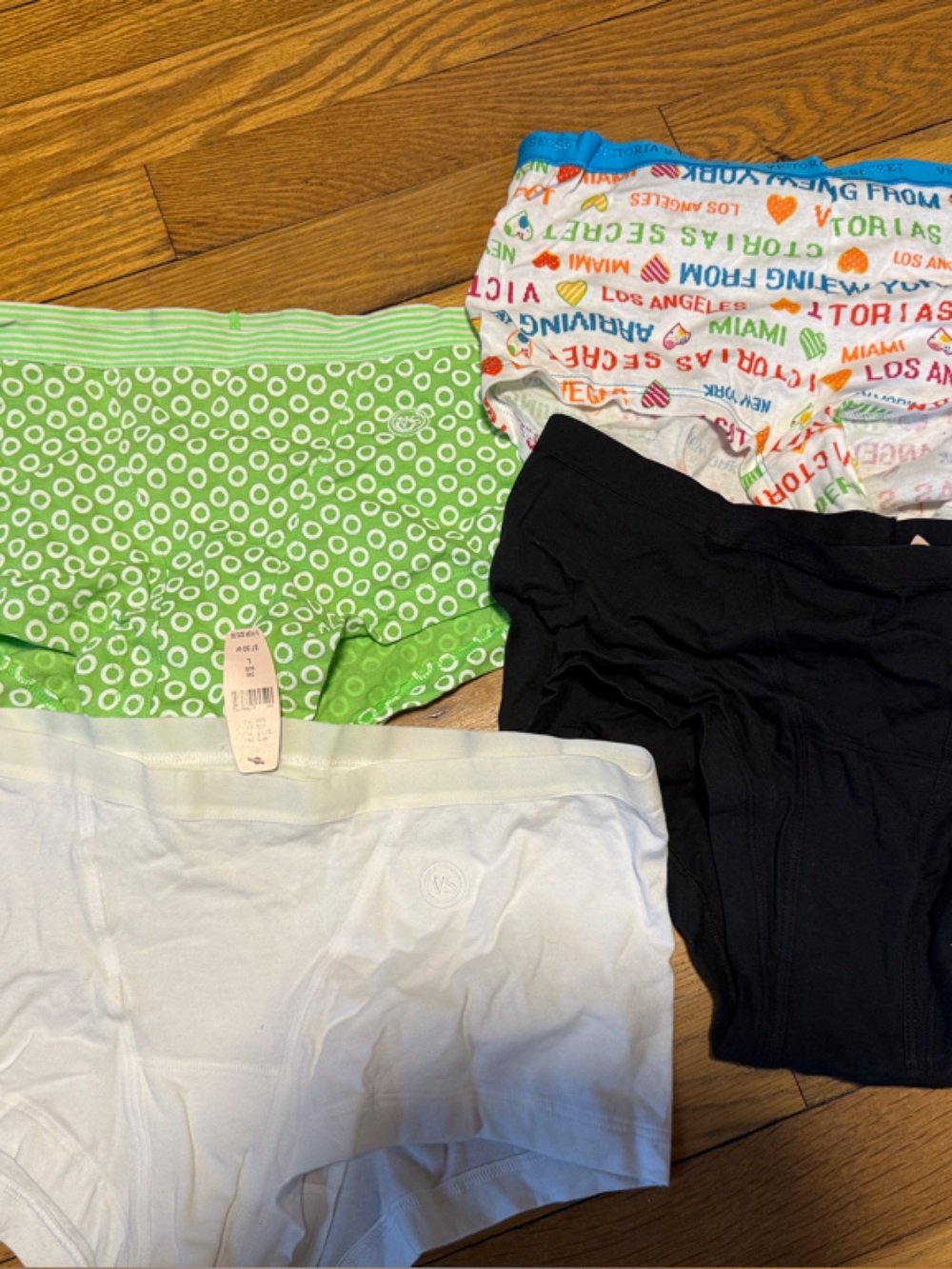 Victoria's Secret Four-Pack boyshort Panties. NWT.  Women’s large